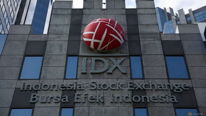 Stock market display showing equity prices and currency exchange rates