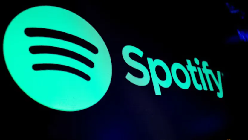 Smartphone and headphones illustrating a music-streaming service