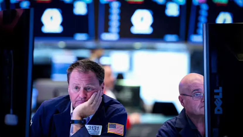 Stock market screens displaying technology share prices
