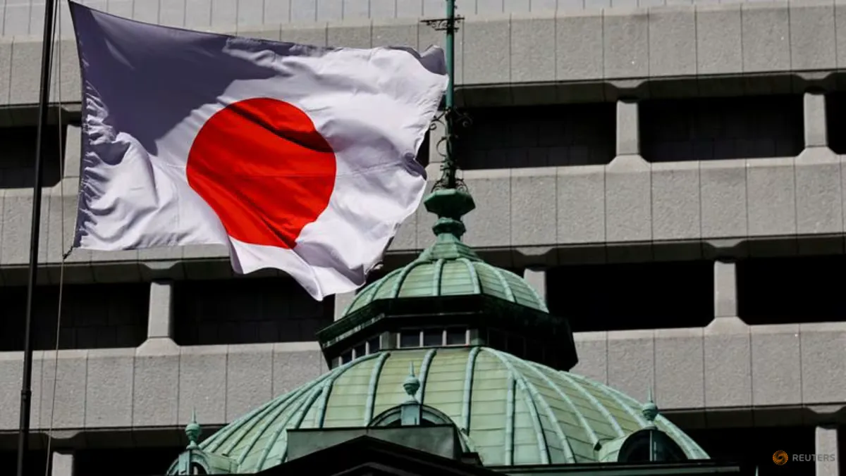 Japanese yen banknotes beside a chart illustrating interest rates