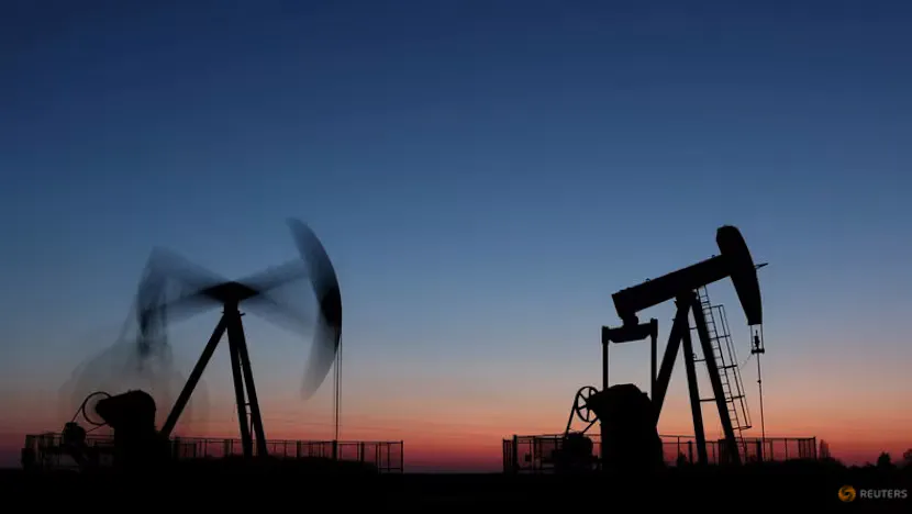 Oil storage tanks and pipelines at an energy facility