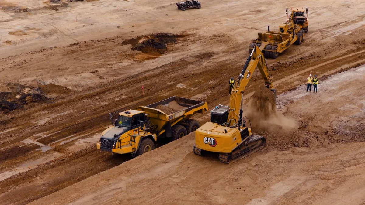 Excavator positioned at an earthmoving construction site