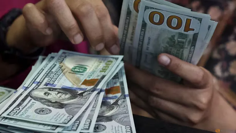 Currency trading screens displaying dollar, euro and yen exchange rates