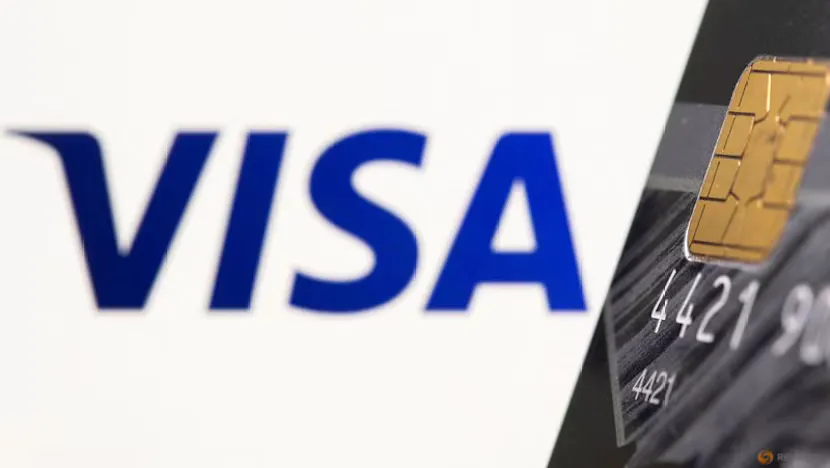 Payment card beside a retail checkout terminal
