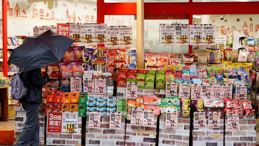 Shopping baskets and price labels in a Japanese supermarket
